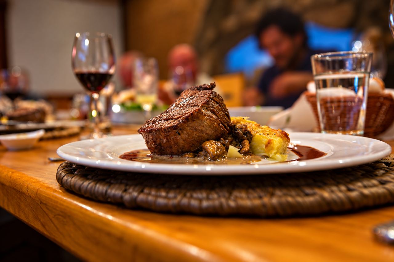 Guests sharing dinner at the lodge