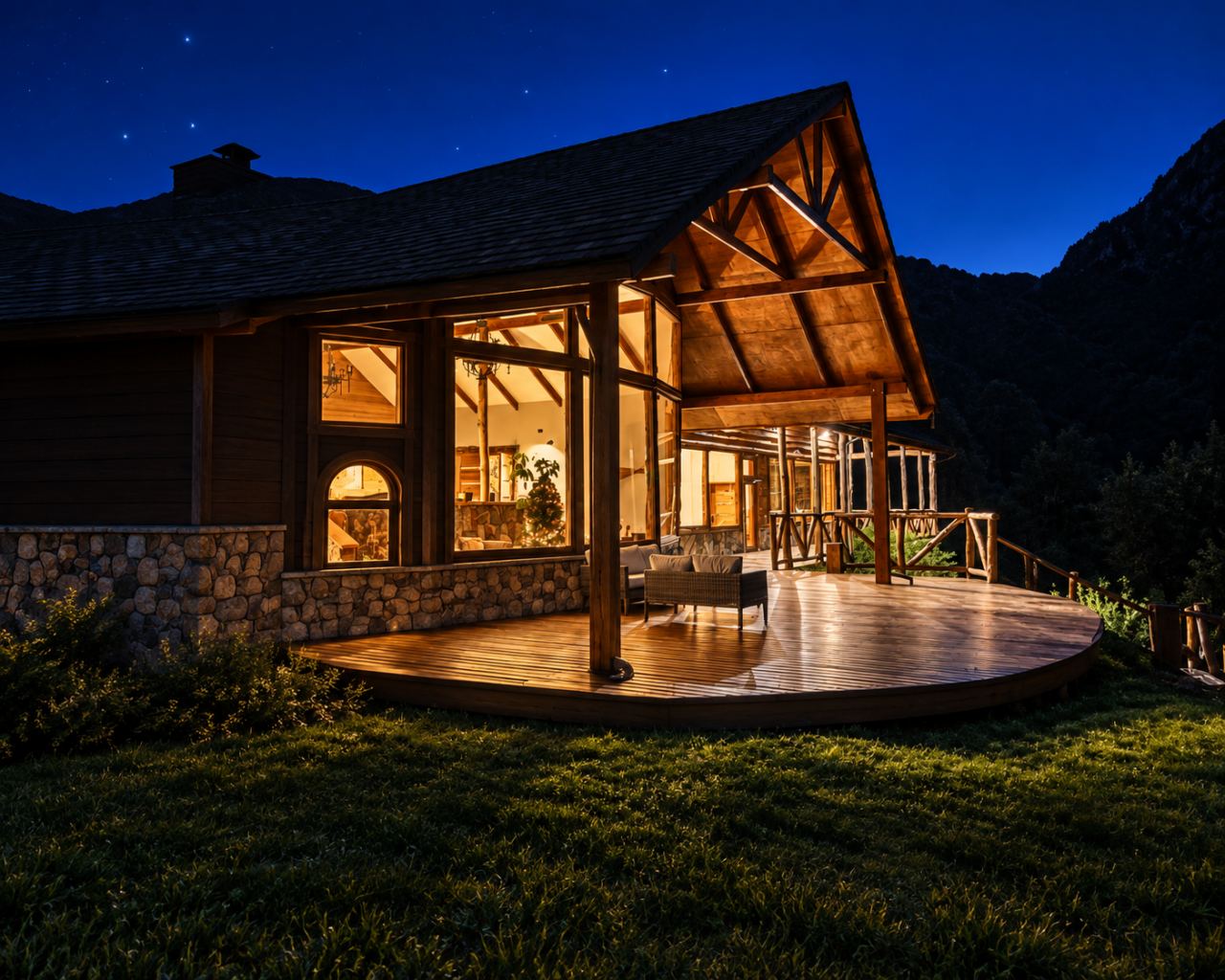 Lodge exterior lit at dusk under a starry sky